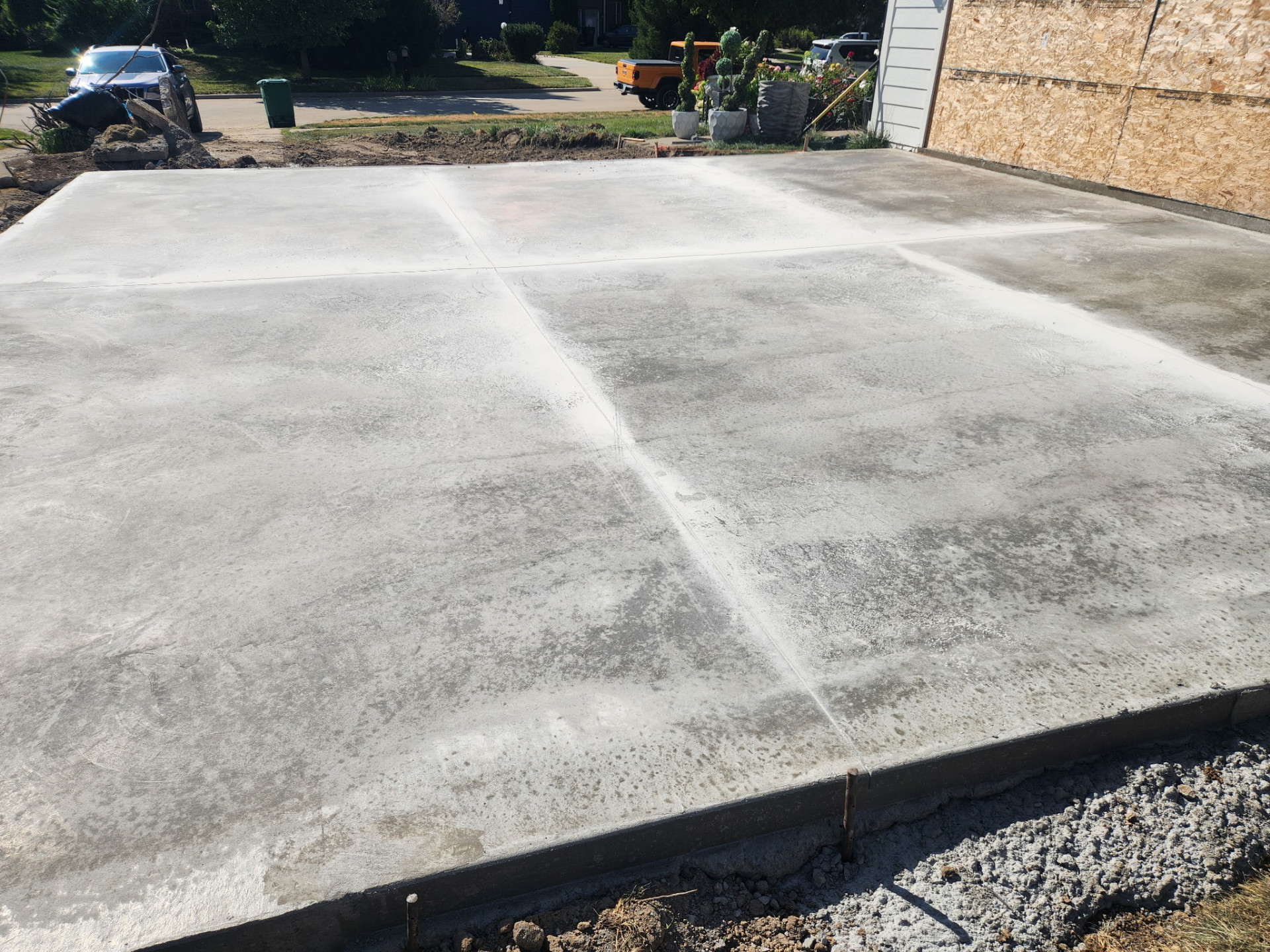 Concrete Driveway Installation Modern concrete driveway in West Des Moines, Iowa