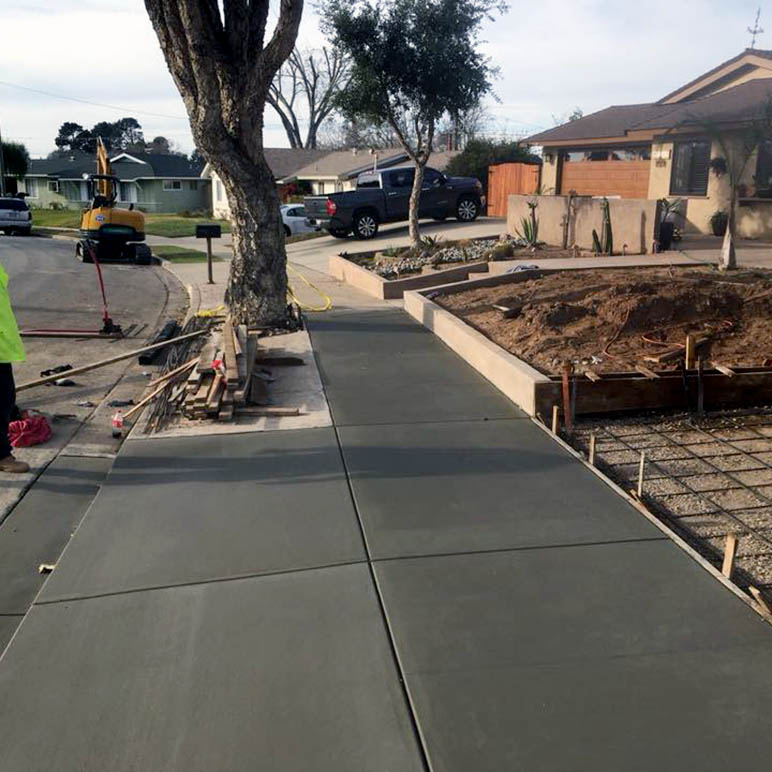 Illustration of a cracked, heaving concrete sidewalk condition